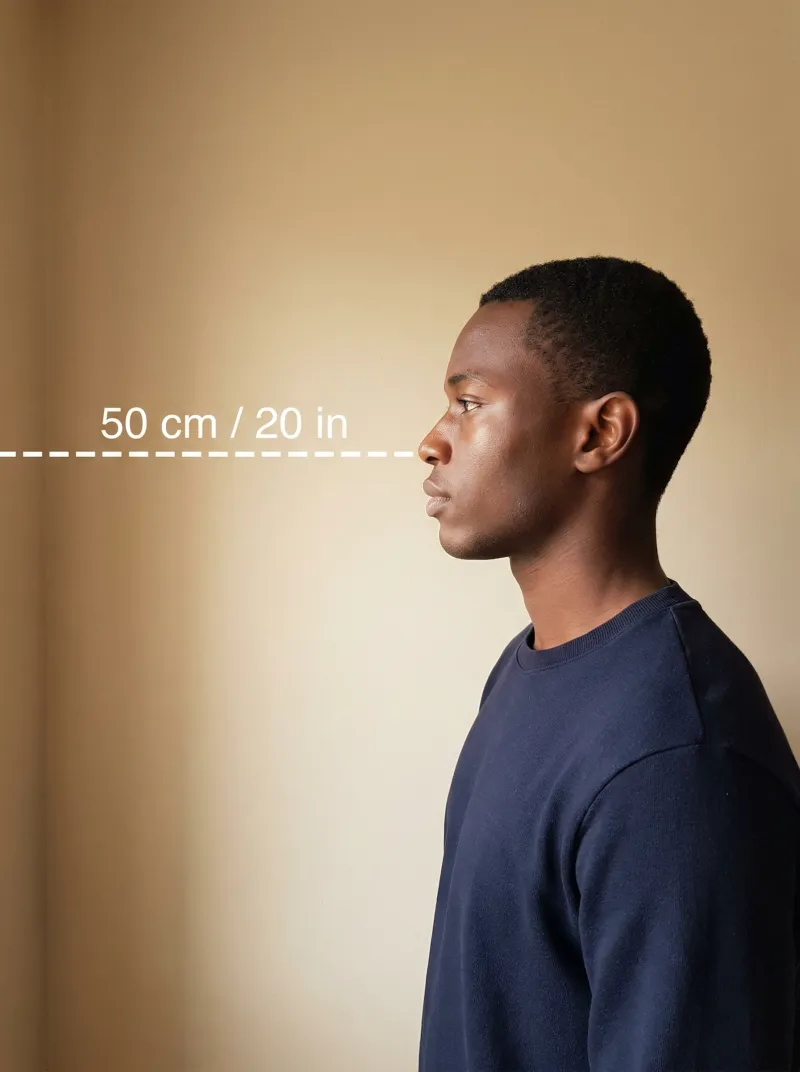 Distance from the camera — Nigeria visa photo tip